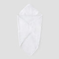 A white baby hooded towel