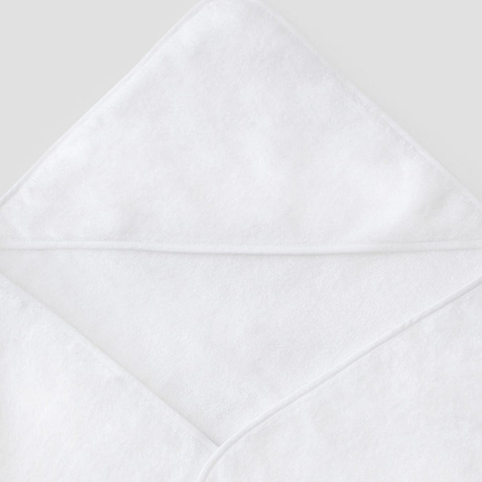 Close-up of a white baby hooded towel