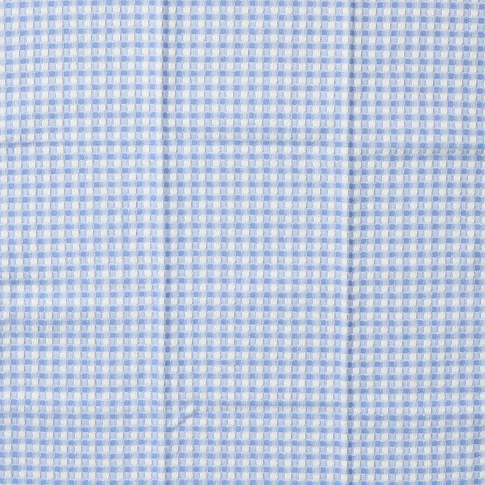 Close-up of light blue checkered fabric texture