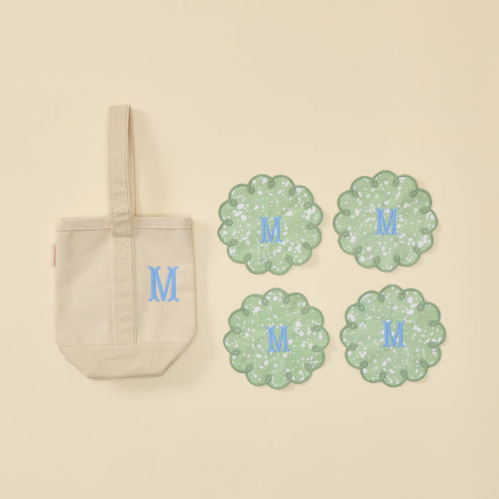 Plain natural canvas wine tote bag and 4 green speckle cocktail napkin with "M" monogram.