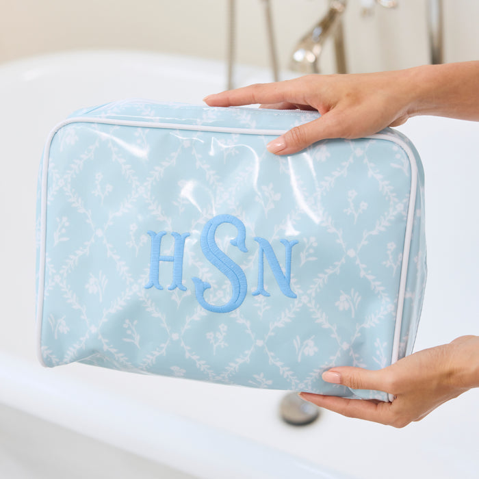 photo of the large patterned toiletry bag archive in Blue Trellis with embroidery