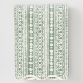 A folded cotton towel with a vertical knit pattern in sage green and white, shown against a plain light gray background.