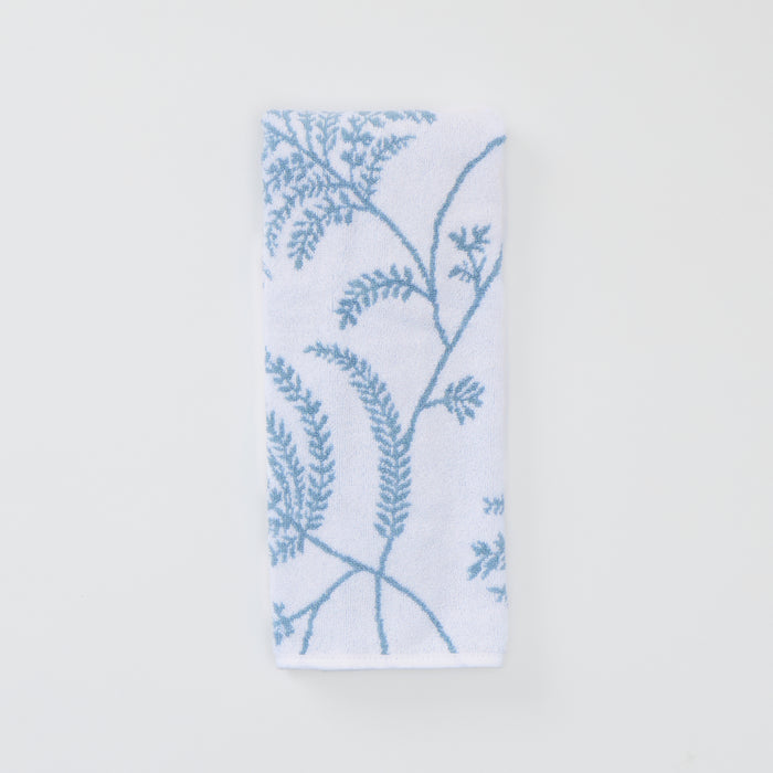 Hand towel with a light blue Palmero botanical pattern