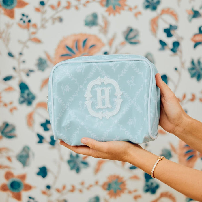 A photo of the small patterned toiletry bag archive in Blue Trellis