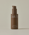 A brown bottle with a pump dispenser labeled "Nightly Retinol Serum," designed for hydration and reducing fine lines, is displayed against a plain light beige background.