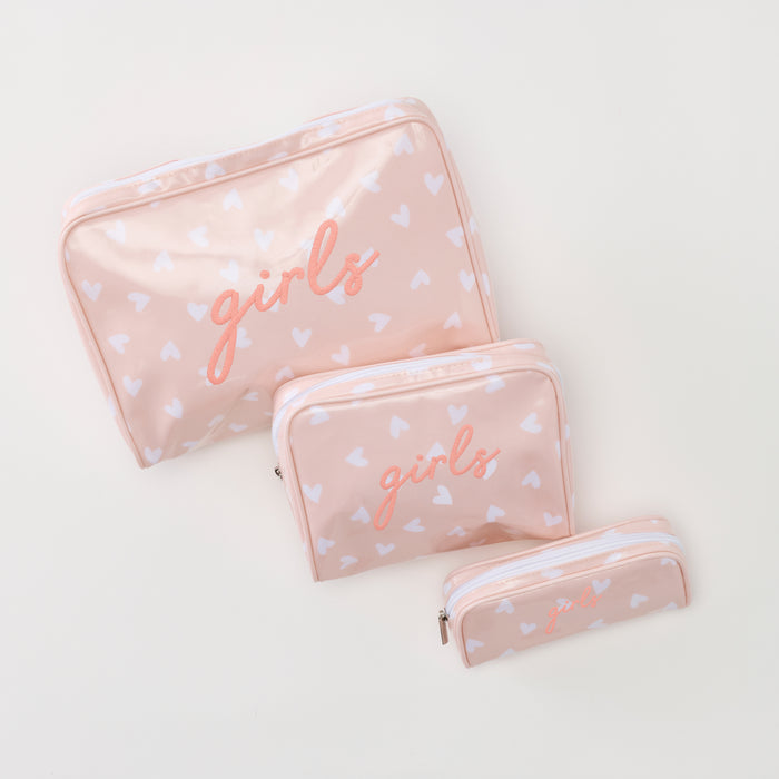 photo of the patterned toiletry bag trio (large, small, and medium) in Tossed Pink Hearts Archive