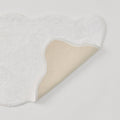 Crisp white scalloped bath runner with white trim.