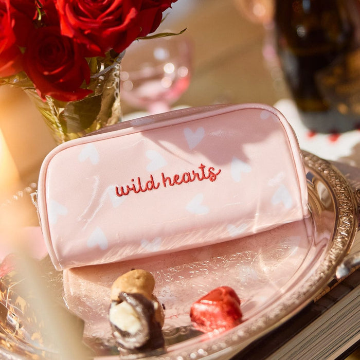photo of the mini patterned toiletry bag in Tossed Pink Hearts Archive