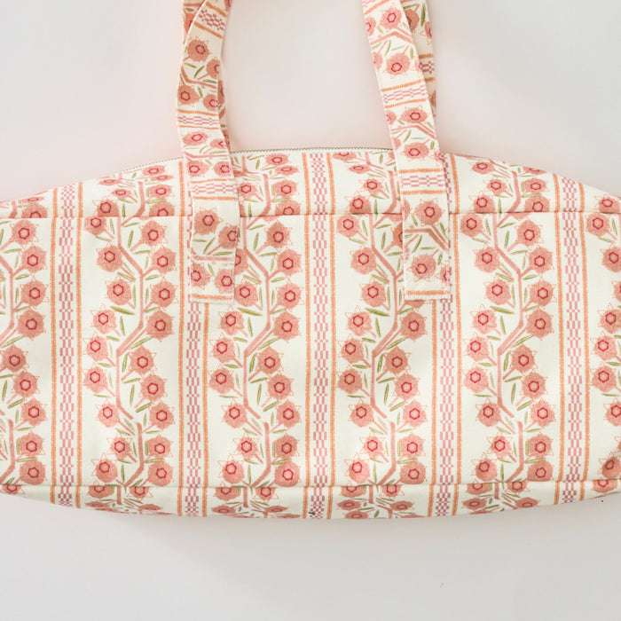A rectangular fabric Mahjong bag featuring a peach and white floral climbing vine pattern with vertical striped accents and two matching carrying handles.