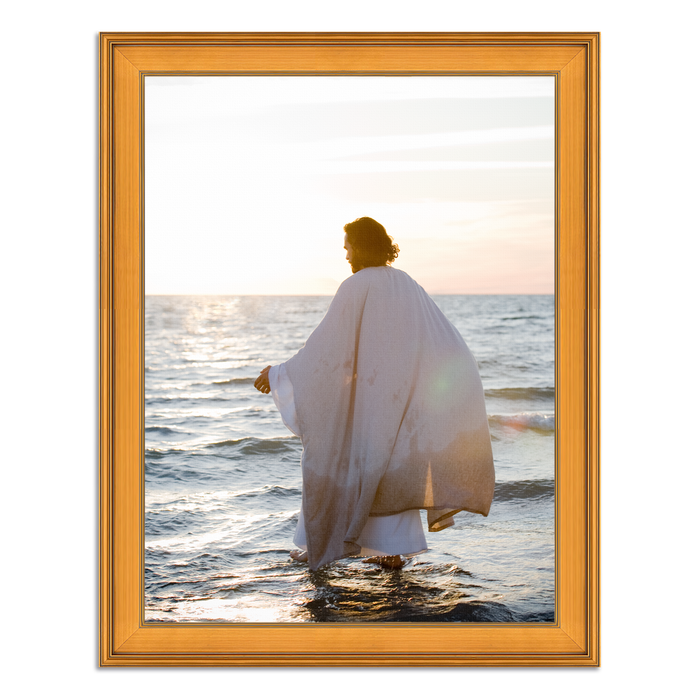 Walking on Water by Reflections of Christ, Jesus walking on water at sunset, shown in a Plein Air gold frame. Christian canvas wall art.