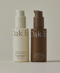 The Youthful Skin Serum Duo includes a cream-colored Firming Plant Peptide Serum for hydration and a brown Nightly Retinol Serum for wrinkle reduction. Both 30 ml bottles feature pump dispensers for easy use.